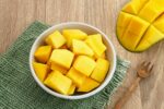 A bowl of sliced ​​fresh mango cubes